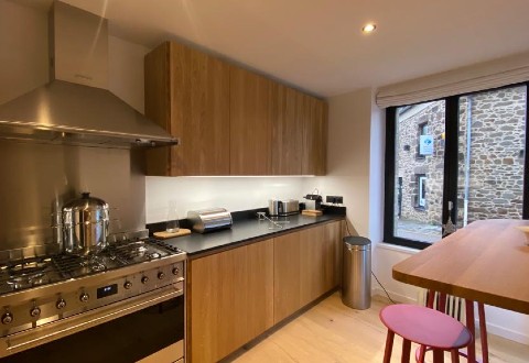 A kitchen transformed with 3-ply oak panels