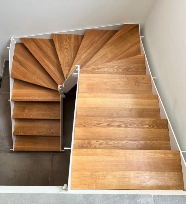 A wooden staircase with PANOPLOT
